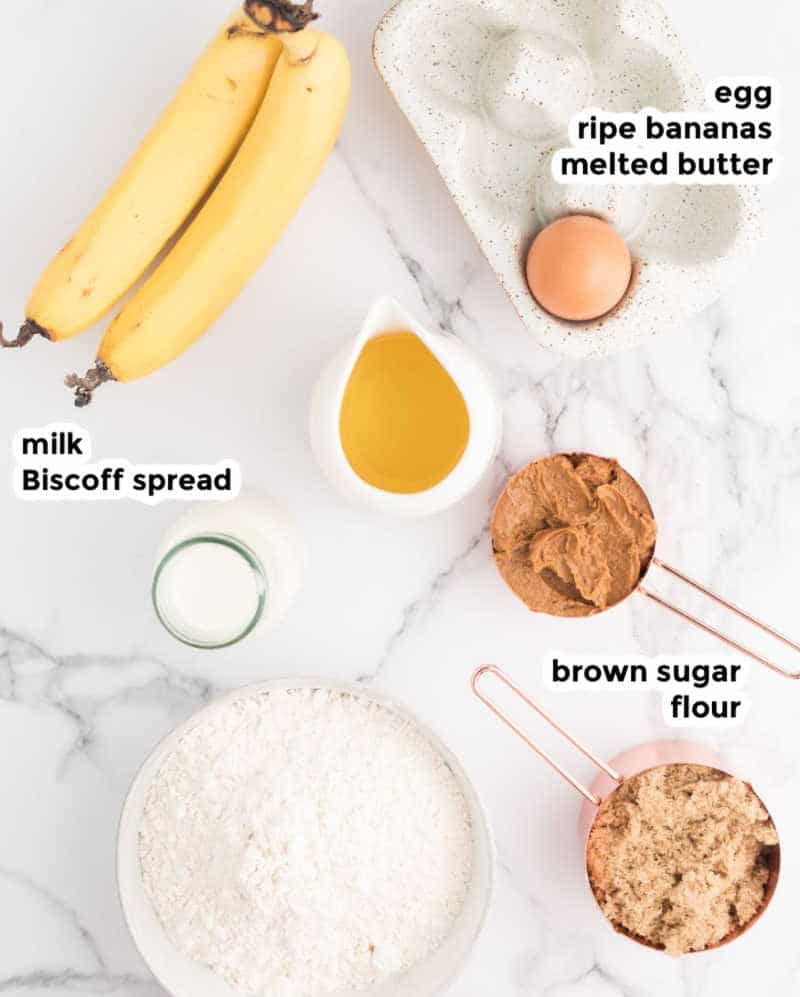 Overhead ingredient shot of ingredients needed for banana biscoff muffins