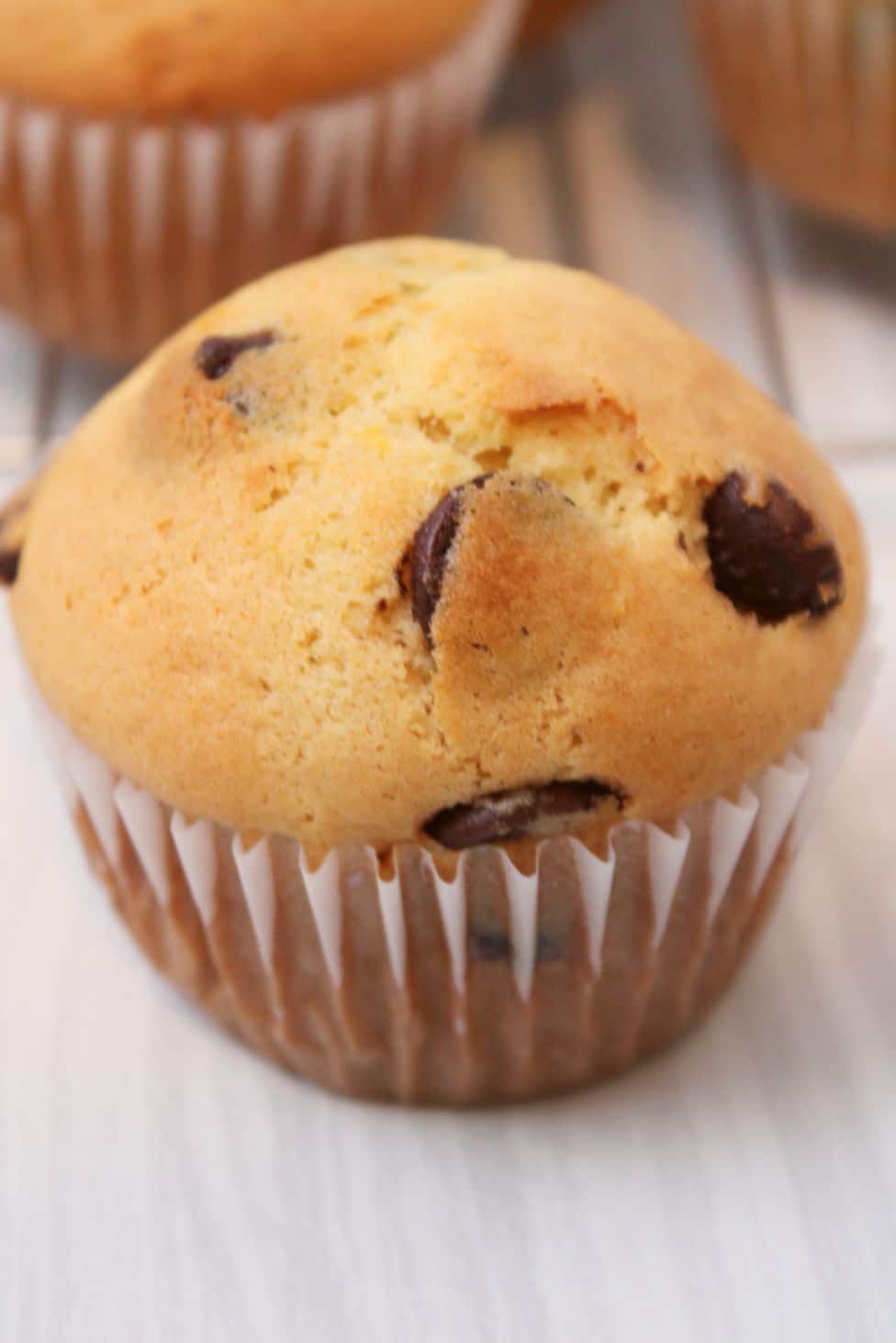 Up close shot of an unglazed muffin with chocolate chips