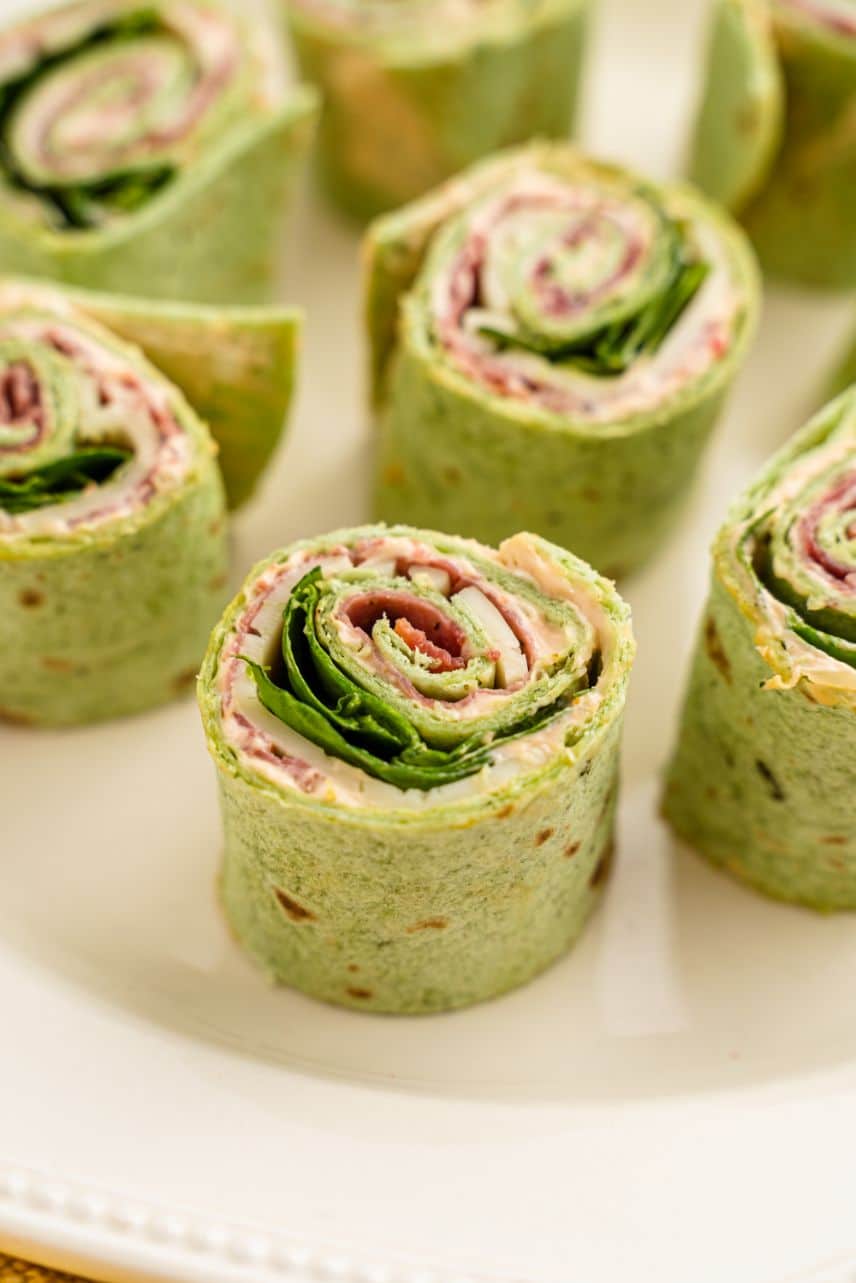 Spinach tortilla pinwheels sliced into evenly sized pieces