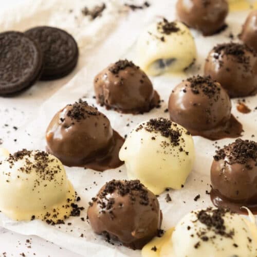 White and dark chocolate oreo balls topped with crushed oreos